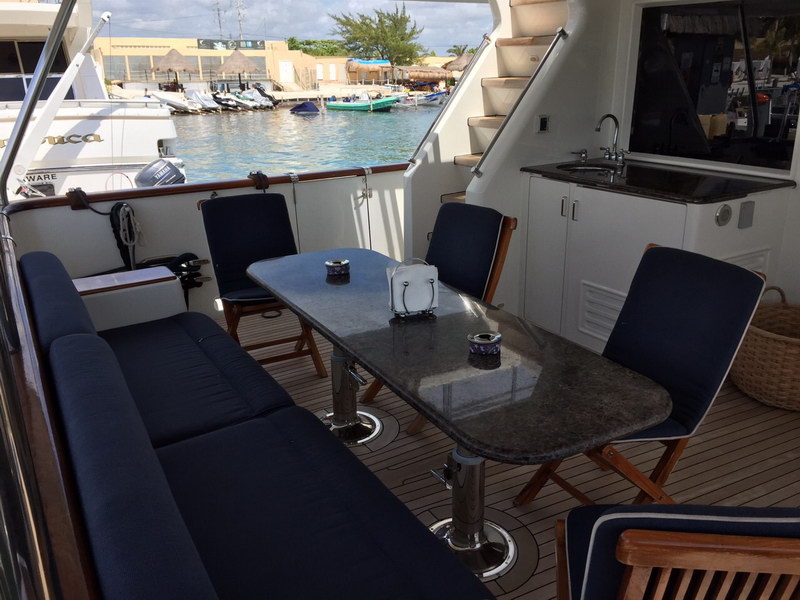 Australis 78 ft luxury yacht exterior bow view in turquoise Caribbean water, classical mega yacht charter Cancun