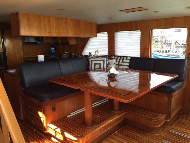 Australis 78 ft classic yacht stern deck and swim platform with Caribbean island scenery, private charter rental