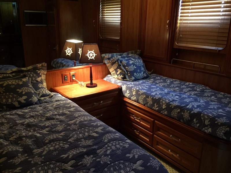 Australis 78 ft luxury classic yacht at anchor in turquoise Caribbean near Holbox or Cozumel, overnight trip