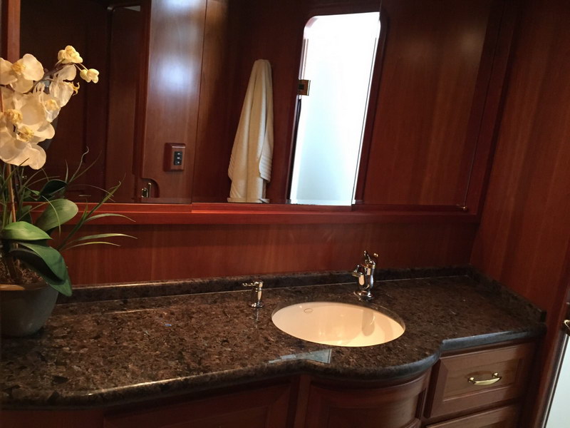 Australis 78 ft classical mega yacht interior detail showing elegant nautical furnishings and wood accents