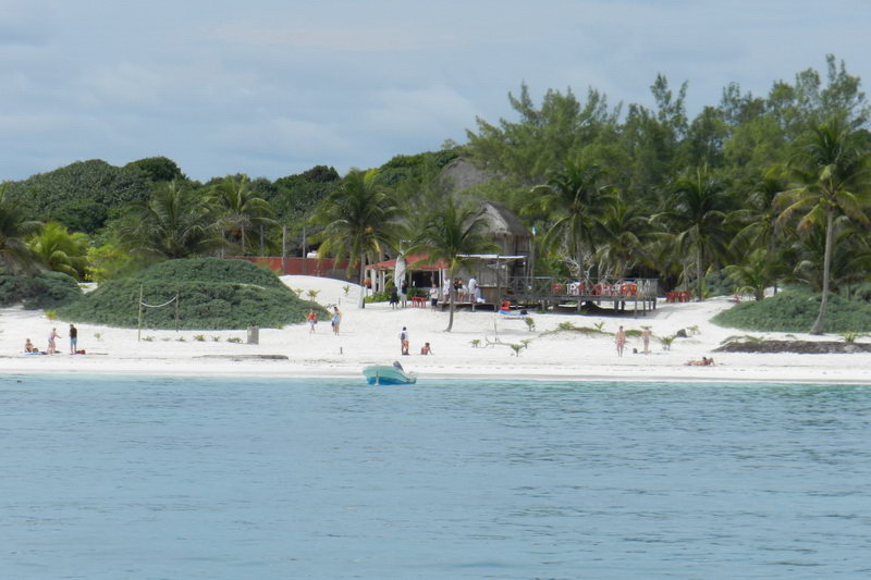 Snorkeling excursion from Raiatea group catamaran in crystal turquoise Caribbean waters Riviera Maya reef tour
