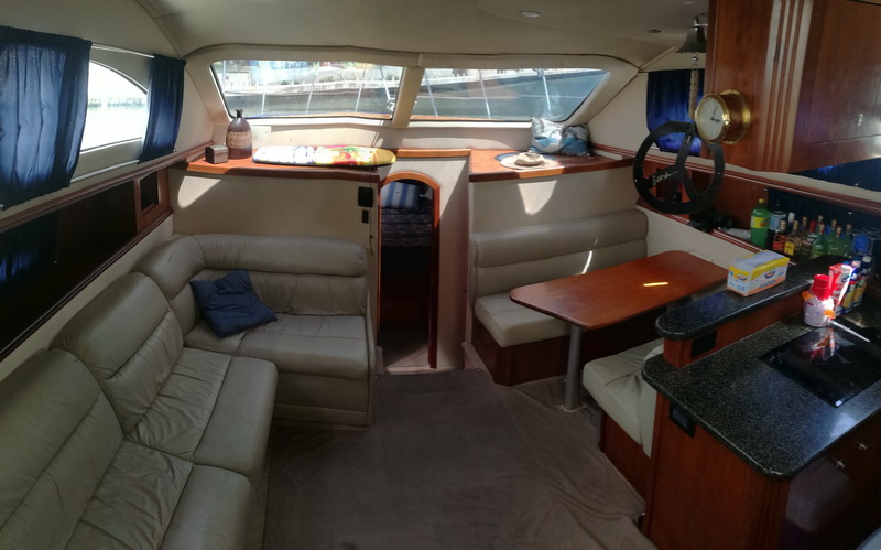 40 ft charter yacht rear deck Puerto Aventuras marina Riviera Maya snorkeling Cozumel private tour